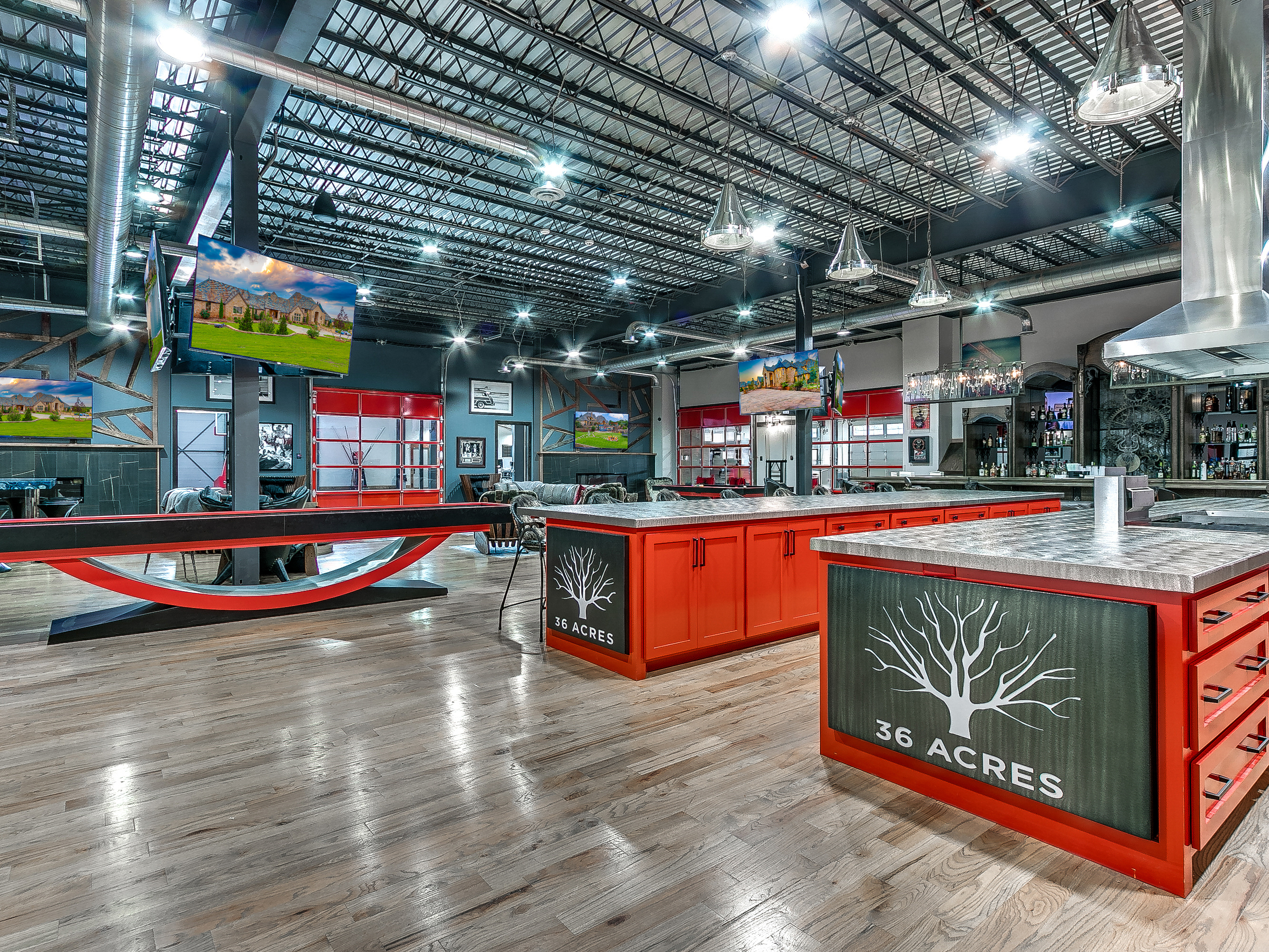 Game lounge — 36 Acres branded bar islands and pool table